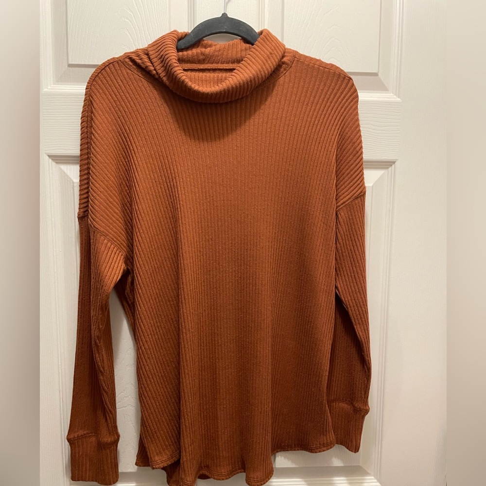 Long flowy burnt orange turtle neck
